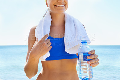 Buy stock photo Fitness, body and woman in sea at beach for health, endurance exercise or hydration in summer. Sports, wellness and running with young athlete in ocean for training, workout or performance challenge