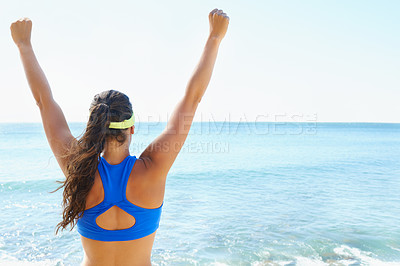 Buy stock photo Woman, back and winner, arms up and ocean with success and runner at the beach, fitness and celebrate outdoor. Workout, training and winning with freedom, achievement and goals in nature for exercise
