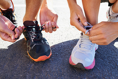Buy stock photo Shoes, hands and people tie laces for run, closeup for fitness and cardio outdoor, athlete team and workout. Training for race, marathon and runner group with sneakers, exercise and sports for health