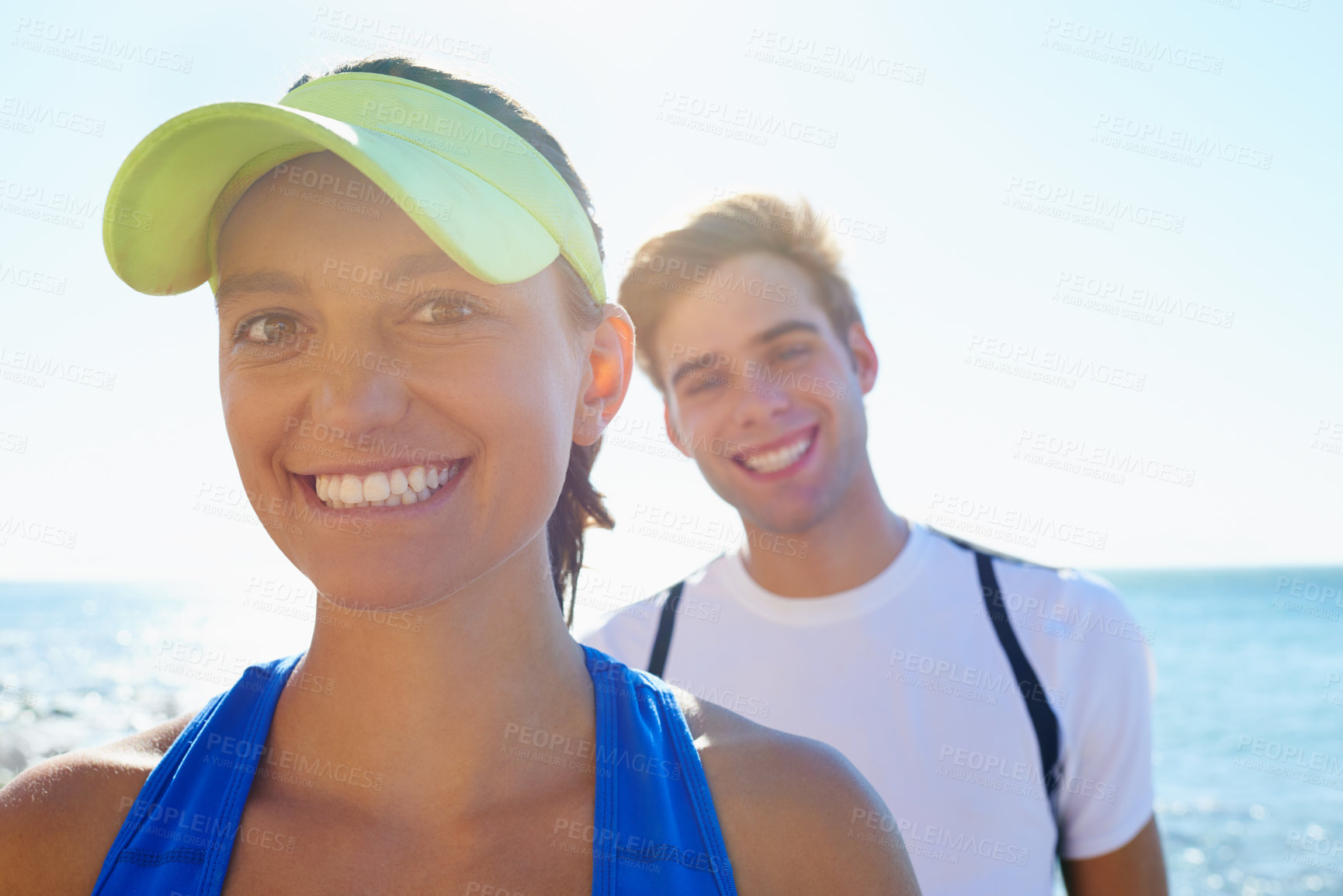 Buy stock photo Happy couple, outdoor and portrait in beach, workout and fitness with smile, training and sunrise for run. Man, woman and athletic in ocean, sea and exercise together in summer, morning and young
