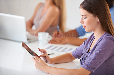 Buy stock photo Tablet, research and business woman in office at table, networking and internet app in startup. Digital technology, creative designer at desk and professional reading email, information and planning