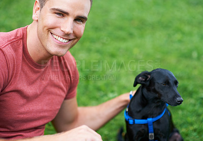 Buy stock photo Man, dog and portrait on outdoor field for bonding connection, pet training for obedience. Male person, animal and face at rescue shelter garden for happy home care, environment walk on grass hug
