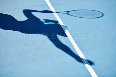 Buy stock photo A shadow of a tennis player ready to serve