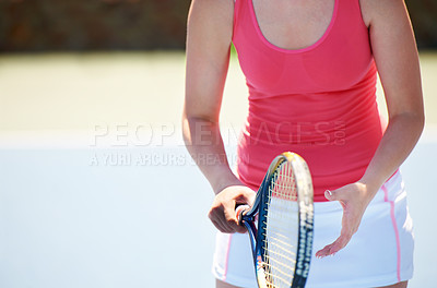 Buy stock photo Cropped shot of a young tennis player