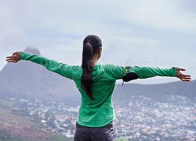 Buy stock photo Hiking, achievement and back of woman on mountain with pride, freedom and celebration in nature of Cape Town. Outdoor, fitness and person with success in landscape on hill with skyline of city