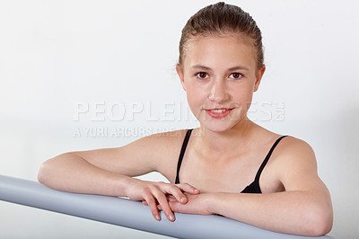 Buy stock photo Portrait, ballet and happy girl on barre in studio, practice and student exercise isolated on white background mockup. Ballerina, young teenager or training, dance choreography for art or performance