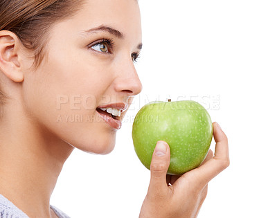 Buy stock photo A young woman holding an apple - isolated