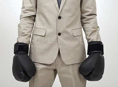 Buy stock photo Boxing gloves, studio hands and business person, fighter or lawyer ready to fight for law. Suit, closeup boxer and advocate for legal defence, protection and security on white background