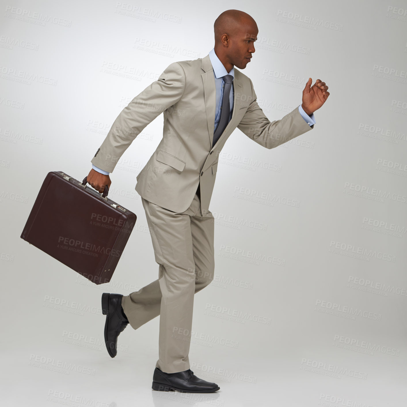 Buy stock photo Businessman, briefcase and running in studio as lawyer or late meeting, time management or corporate. Male person, rush and white background as professional or job employment, competition or mockup
