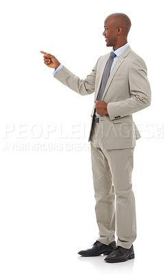 Buy stock photo Businessman, presentation and pointing for advertising or marketing on a white studio background. Black man or young employee showing choice, deal or information in business clothing on mockup space