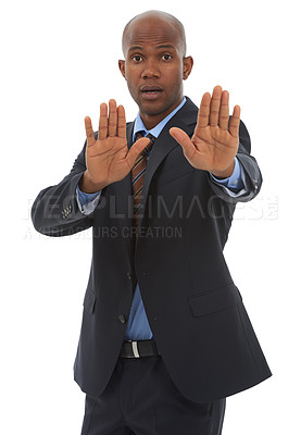 Buy stock photo Businessman, portrait or hand gesture in studio for stop for danger warning or threat on white background. African worker, palm or body language with attention, worry or fear for protection or safety