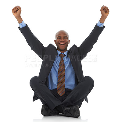Buy stock photo Happy businessman, portrait and fist pump for promotion, bonus or celebration on a white studio background. Excited black man or employee smile sitting on floor for winning, achievement or promo deal
