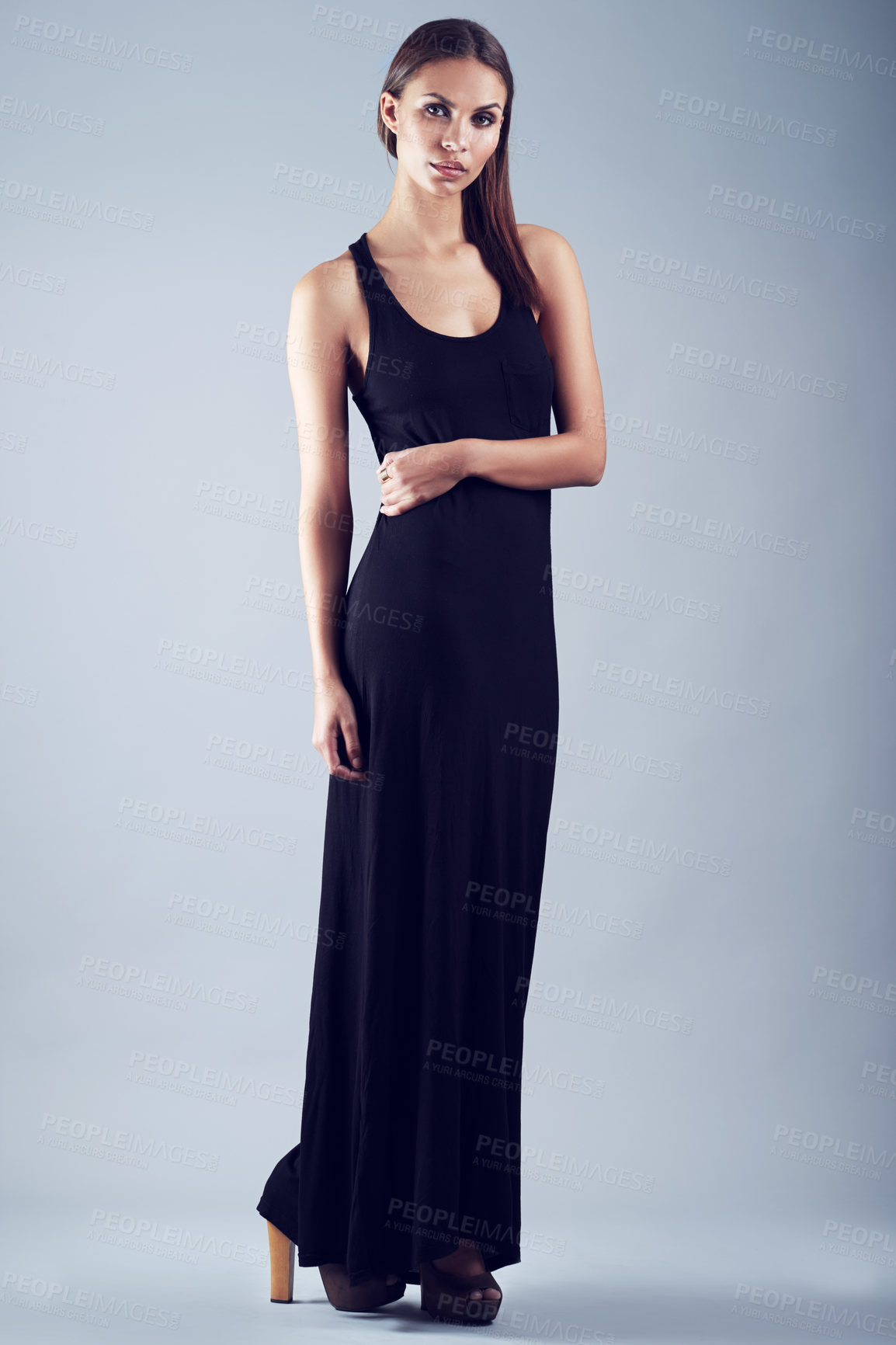 Buy stock photo Portrait, fashion and confident woman in studio on gray background for elegant or classy style. Luxury, classic and clothing with beautiful young model in black dress outfit for formal event