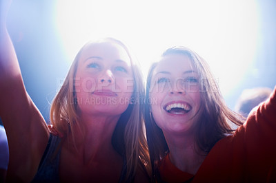 Buy stock photo Friends, dance and music at concert, excited and party in nightclub, festival and dj event. Disco, rock and freedom with girl dancing in crowd of fans for celebration, energy and techno performance