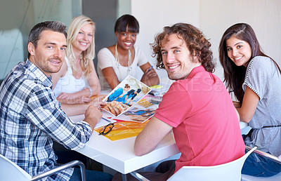 Buy stock photo Portrait, team and happy business people at table in meeting together, cooperation or collaboration in startup. Face, smile or creative group of designers with photograph, brainstorming strategy plan