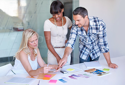 Buy stock photo Teamwork, creative and business people planning at table in meeting, decision or collaboration in office startup. Happy group, designer and color swatches on picture or brainstorming palette together