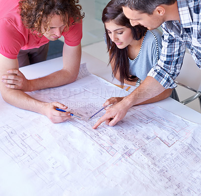 Buy stock photo Planning, teamwork and architect on blueprint working on creative project on startup table. Serious group, designer and engineer on drawing, document and people brainstorming sketch for construction