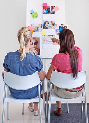 Buy stock photo Woman, pointing and whiteboard for sticky notes in office with back for discussion, planning or collaboration. Creative, writer or team for idea, moodboard or advice for magazine design by pictures