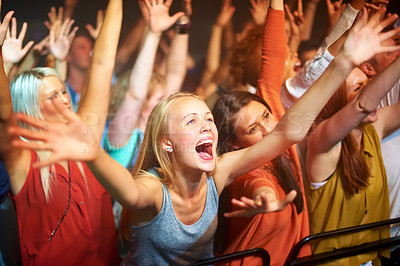Buy stock photo A huge group of fans screaming at a rock concert