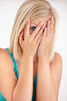 Buy stock photo Fear, portrait and woman with hands on face, scared and confused with trauma in horror studio. Panic, scary danger and shocked embarrassed girl with stress, anxiety and terror on white background.