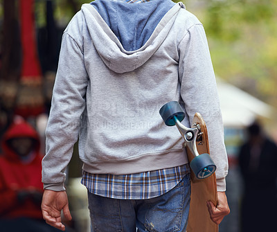 Buy stock photo Back, closeup and man with a skateboard, outdoor and fitness with exercise, hipster and freedom. Extreme sports, person and cool guy with balance, New York city and skater with summer break or travel