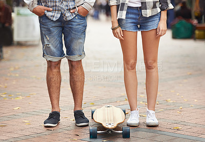 Buy stock photo Skateboard, legs and urban couple of friends ready for travel ride, outdoor exercise or skills training in city. Active, cardio fitness and feet of skateboarder for street journey, practice or skate