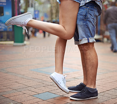Buy stock photo Legs, love and travel with couple hugging in city together for adventure, holiday or vacation abroad. Shoes, sidewalk or town with man and woman tourist outdoor for romance, dating or sightseeing