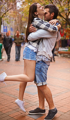 Buy stock photo Couple, hug and outdoor in city, laugh and excited with love, bonding together and romantic relationship. Cape town, embrace and enjoy with boyfriend and girlfriend in street, summer and dating
