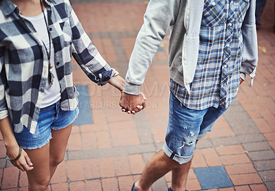 Buy stock photo Love, walking and couple holding hands on relax journey, morning trip or weekend tour for outdoor adventure. Fashion, casual clothes and romantic people commute on street, road or sidewalk floor