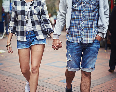 Buy stock photo Urban, walk and couple holding hands, relax and travel on outdoor journey, morning trip or weekend city date. Casual clothes, fashion apparel and romantic people commute on street, road or sidewalk