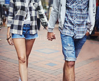 Buy stock photo Urban journey, walk or couple holding hands, relax and travel for morning wellness, outdoor trip and explore city. Casual clothes, fashion apparel or romantic people commute with care, love and trust