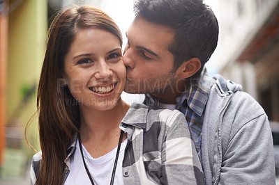 Buy stock photo Love, portrait and happy couple hug, kiss and together for outdoor date, bonding and romantic affection. Wellness, happiness and face of boyfriend, girlfriend or people smile for relationship care