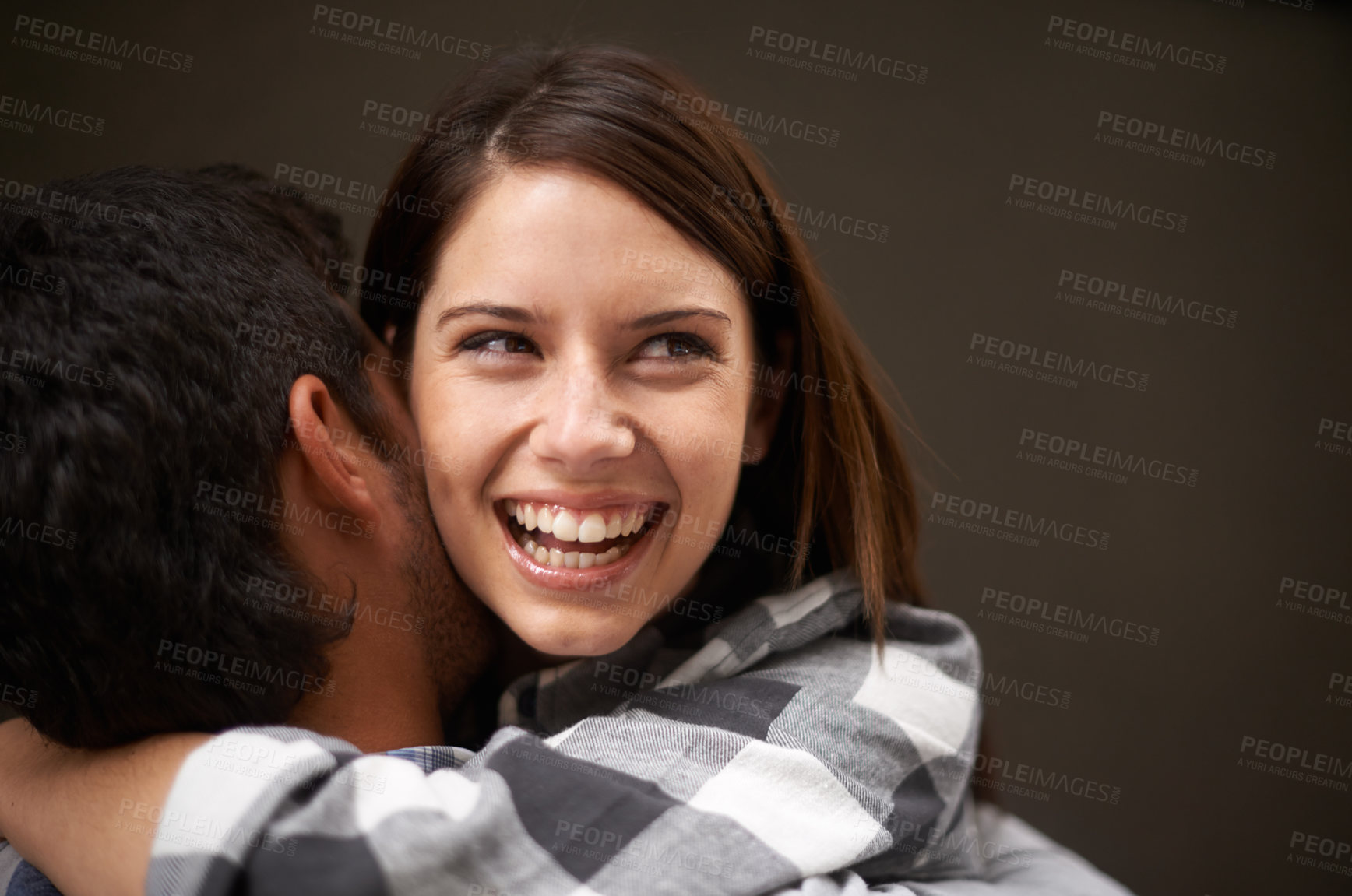 Buy stock photo Love, happy woman and face of couple hug together, excited and smile for studio reunion, care and romantic connection. Girlfriend embrace, happiness and relationship people bond on brown background