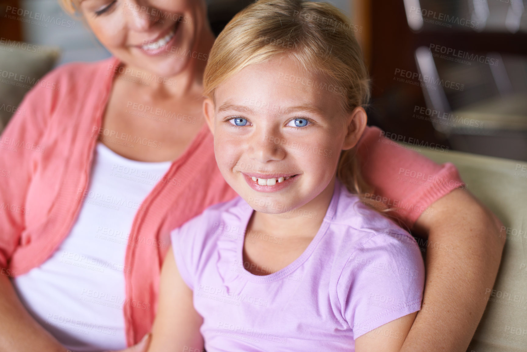 Buy stock photo Mother, girl and relaxing on couch in portrait, bonding and love in childhood by single parent at home. Daughter, mommy and caring together in living room, embrace and security or enjoying connection