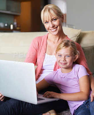 Buy stock photo Mother, child and laptop in portrait in living room, happy and streaming subscription in apartment. Daughter, woman and face by computer for online cartoon on couch, technology and connected in house