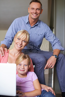 Buy stock photo Happy family, portrait and laptop in living room on internet and streaming subscription in apartment. Daughter, woman or man with smile face by online video on couch, technology or connected in house