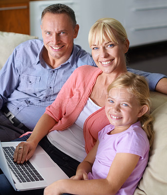 Buy stock photo Portrait, laptop and parents with daughter on sofa in living room of home for entertainment streaming. Family, love or smile with happy mom, dad and girl child watching video on computer in apartment