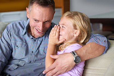 Buy stock photo Shot of a little girl and her father at home
