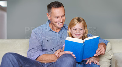 Buy stock photo Father, child and reading book for education at home, story and fantasy fiction for learning. Daddy, daughter and bonding together in childhood, literacy and storytelling for language development