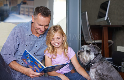 Buy stock photo Father, child and reading book for learning at home, story and fantasy fiction for education. Daddy, daughter and dog bonding together, literacy and storytelling for language development or growth
