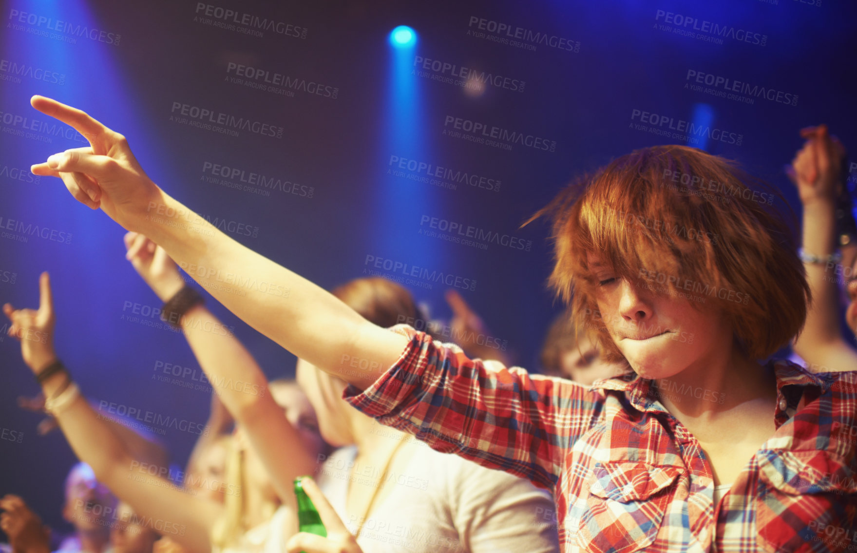 Buy stock photo A crowd of fans rocking out to the music. This concert was created for the sole purpose of this photo shoot, featuring 300 models and 3 live bands. All people in this shoot are model released.