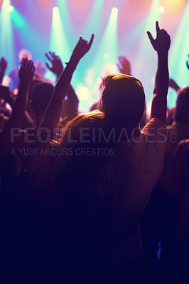 Buy stock photo A crowd of people watching a band play on stage at a nightclub. This concert was created for the sole purpose of this photo shoot, featuring 300 models and 3 live bands. All people in this shoot are model released.