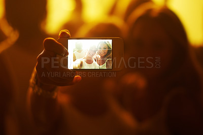 Buy stock photo Friends, women and selfie with phone screen, party or happy in portrait, nightclub or web blog. Girl, people and smartphone for photography, memory or profile picture at concert, rave or social media