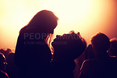 Buy stock photo Festival, concert and couple dance at night together with happiness and energy from stage lights and music. Club, party and silhouette of people with love and embrace in dark at disco, date or rave