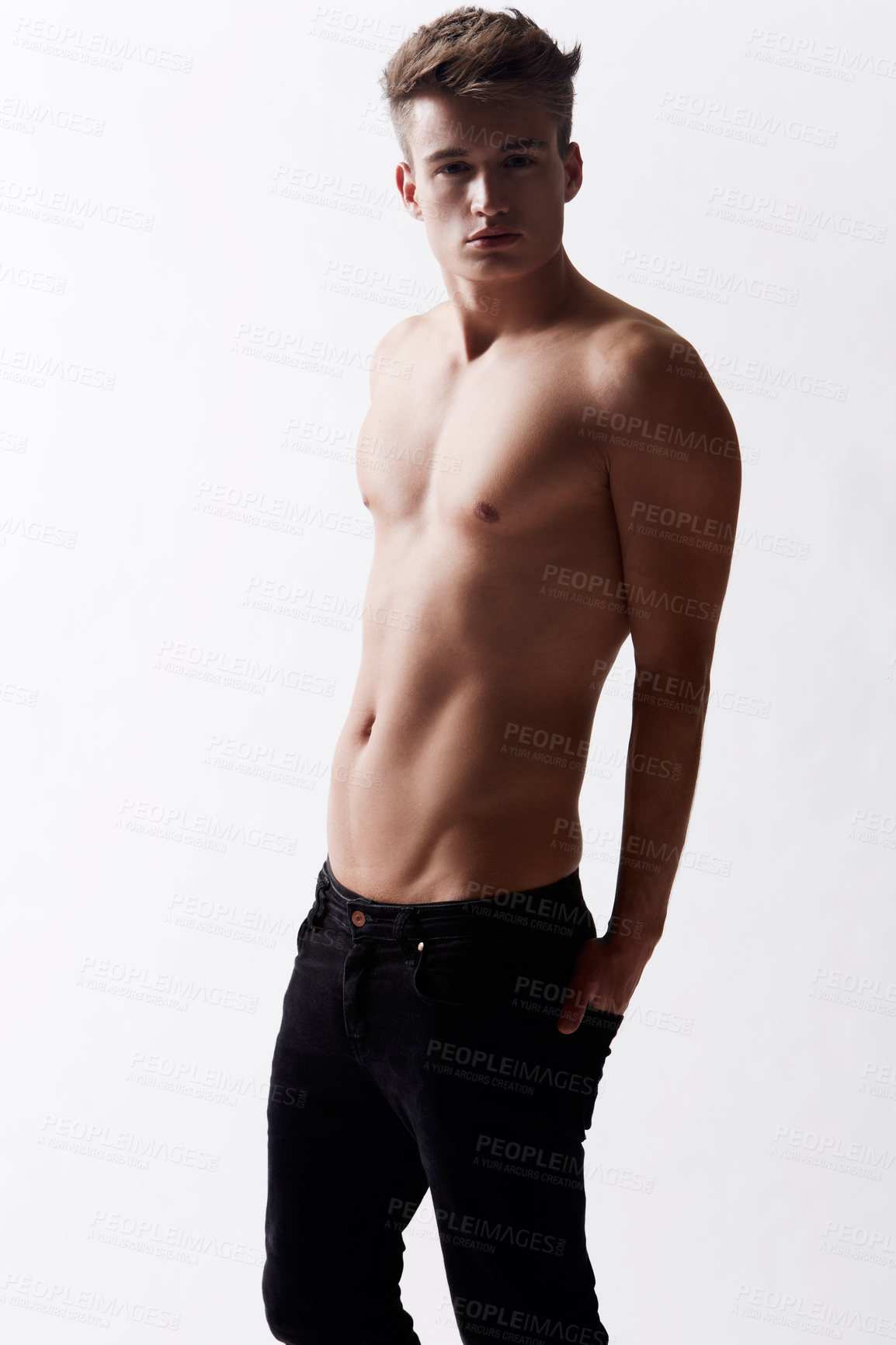Buy stock photo Portrait, natural and masculine with body of man in studio on white background for health or wellness. Aesthetic, beauty and skin with young shirtless model in jeans for hygiene and satisfaction