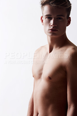 Buy stock photo Portrait, natural and masculine with shirtless man in studio on white background for health or wellness. Aesthetic, skin or stomach and body of fresh young model in for hygiene and satisfaction