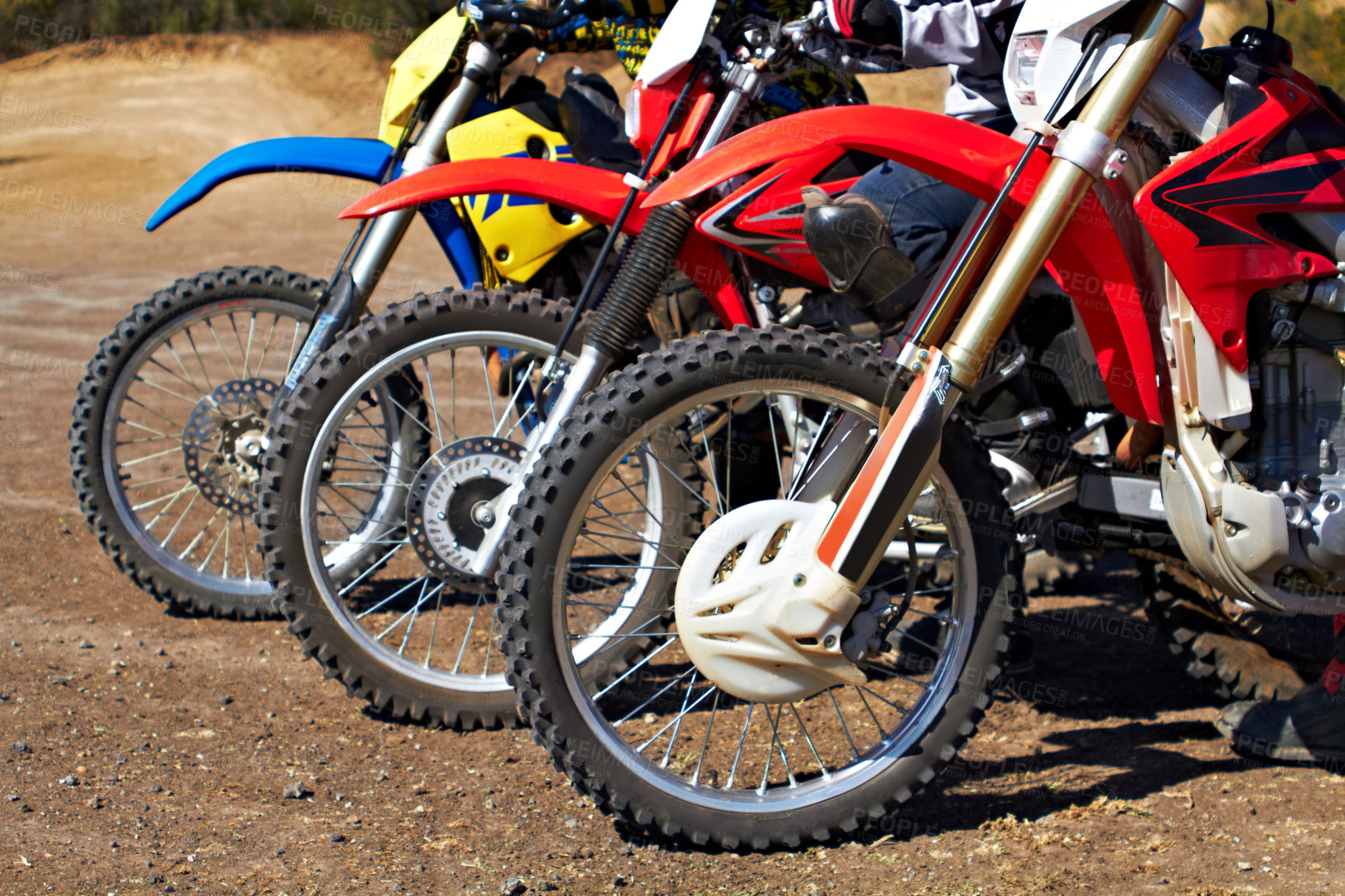 Buy stock photo Shot of dirtbike racers
