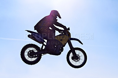 Buy stock photo Shot of dirtbike racers