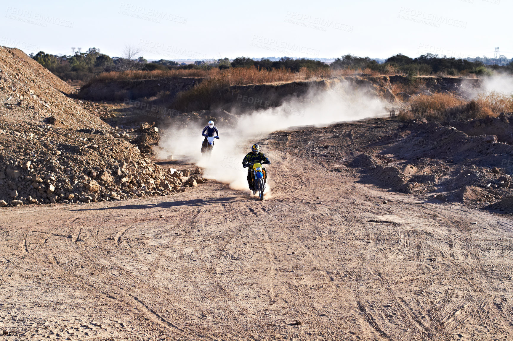 Buy stock photo People in race, motorcycle and sport with speed, action and energy on off road track, transportation and outdoor. Competition, dirt bike and performance with fast biker, exercise and challenge