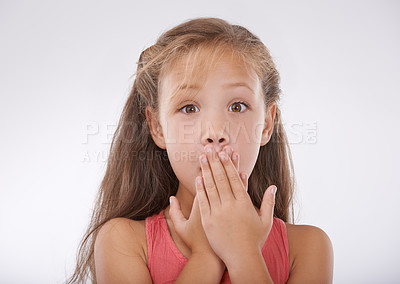 Buy stock photo Child, portrait and hand or mouth for shock information or surprise news for announcement, omg or white background. Female person, face and gesture in studio for gossip emoji, wow or mockup space